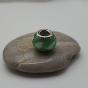 Green with envy charm‎